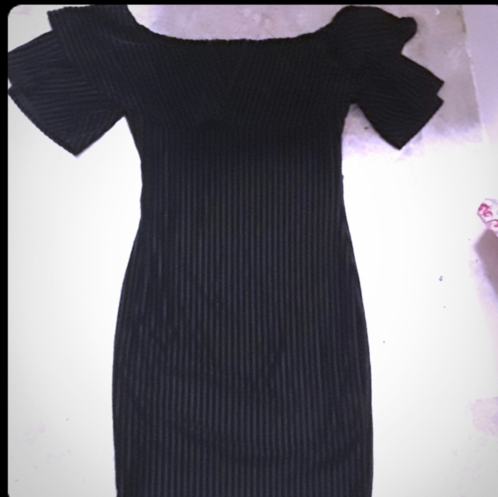 A black dress never worn, but missing tags